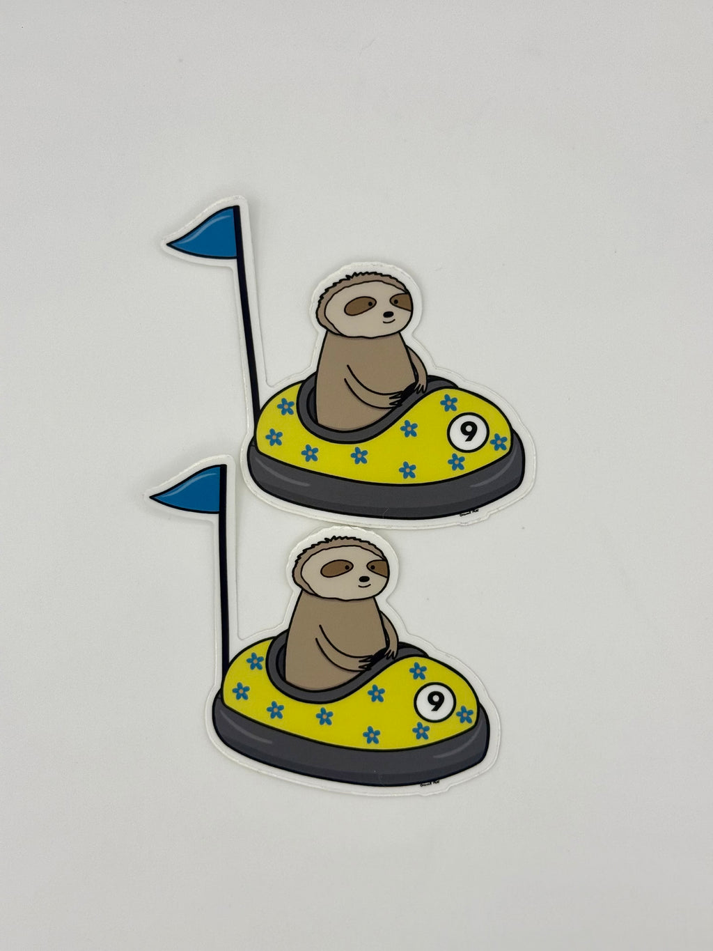 Sloth bumper car Sticker