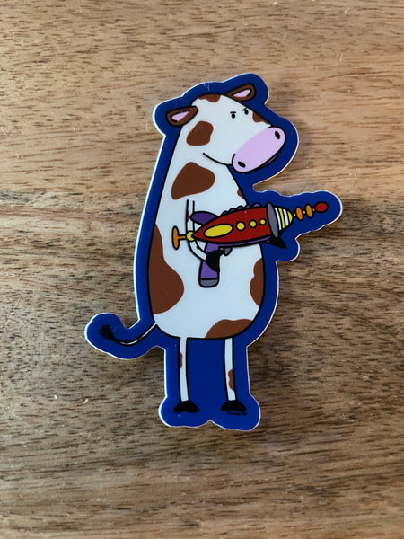 Cow with a ray gun sticker