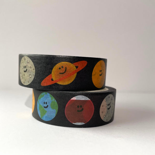 black washi tape with the moon, sun, earth, mars and saturn on it - all smiling